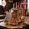 Maker's Mark semi-truck shaped glass whiskey decanter with red wax stopper sitting on a wooden table in a home office.!