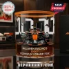 McLaren Racing 1000th Formula 1 Grand Prix whiskey glass with orange rim and central race car graphic on clear glass.!