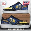 Megadeth Vic Rattlehead custom sneakers featuring yellow toe caps, metal studs, and blue graphic side panels on white soles.!