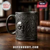Metallica Master of Puppets ceramic mug with silver embossed skull, electric chair, and Est 1981 text on wooden table.!