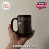 Black ceramic mug featuring a metallic-style graphic of a skull and the Metallica logo with the text EST. 1981.!