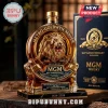 MGM 102nd anniversary single malt scotch whisky bottle featuring a gold lion emblem and dark blue presentation box.!
