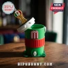 Green plastic beverage cooler with a red M logo, featuring a gold and Mexican flag world cup trophy-themed straw topper.!