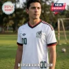 Man wearing a white Mexico national team soccer jersey with green, white, and red trim on a grassy field background.!