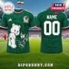 Green Mexico soccer jersey featuring a cartoon bear, a FIFA soccer ball graphic, and customizable back name and number.!