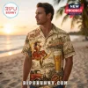 Man wearing tan button-down shirt with vintage Miller High Life beer print featuring a woman on a crescent moon.!