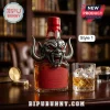 Demon-themed glass whiskey bottle with silver horned creature topper and red wax seal, next to a glass of whiskey.!