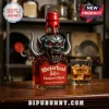 Motorhead 50th anniversary Maker's Mark whiskey bottle with silver horned demon topper and red wax seal on a wooden bar.!