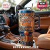New York Knicks 2026 Eastern Conference Champions tumbler with gold filigree, basketball trophy, and logo in car cupholder.!