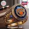 New York Knicks 2025-2026 Eastern Conference championship ring with blue stone, gold metal, and arena engraving.!