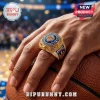 Gold New York Knicks 2016 Eastern Conference championship ring with blue stone, resting on a leather basketball.!