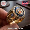New York Knicks 2025-2026 Eastern Conference championship ring with blue stone, gold metal, and stadium engraving.!