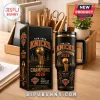 New York Knicks 2026 NBA Champions 40oz stainless steel tumbler with handle and matching gift box on a desk.!
