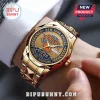 Gold-toned New York Knicks 2026 NBA Champions watch on wrist with blue face, basketball logo, and date display window.!