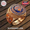 Gold championship ring featuring the New York Knicks logo, blue gemstones, and the text 2026 NBA Finals Champions.!