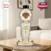 New York Knicks 2026 NBA Finals Champions trophy-shaped glass decanter on a wooden table with team logo and net details.!