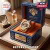 Gold New York Knicks watch with diamond bezel inside a blue leather presentation box with orange velvet lining.!
