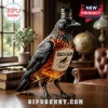 Black crow-shaped glass bourbon bottle labeled Old Crow Kentucky Straight Bourbon Whiskey on a dark wooden desk.!