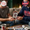 Zippo lighter featuring Ole Miss Rebels graphics held in a blue gift box by a man wearing an Ole Miss hooded sweatshirt.!