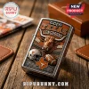 Zippo windproof lighter featuring embossed Texas Longhorns bull mascot, football helmet, and football on wooden table.!