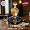 Crystal bust decanter of One Piece character Sanji with 1997-2027 30th anniversary text, sitting on a wooden table.!