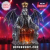 Ozzy Osbourne shaped glass decanter featuring silver-toned bat wings, a golden crown, and skull-adorned throne base.!