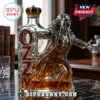 Ozzy Osbourne shaped glass decanter featuring a silver metal figure, red OZZY text, and a purple velvet crown stopper.!
