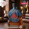 Paris Saint-Germain branded glass decanter featuring a blue and red crest, UEFA Champions League 2025/2026 text, and lid.!