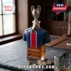 Glass whiskey decanter shaped like a blue and red soccer jersey with a UEFA Champions League trophy stopper.!