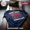 Navy blue soccer jersey with white text reading BACK 2 BACK, the number 26, and CHAMPIONS D'EUROPE on a wooden bench.!