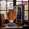 Crystal trophy shaped whiskey decanter with PSG Champions of Europe 2025-2026 branding and blue gift box on wood desk.!