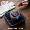 Gold championship ring with Paris Saint-Germain crest, large blue center stone, and red and blue side gems in a box.!