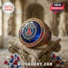 Paris Saint-Germain FC gold championship ring with a large blue center stone, blue and red accents, and engraved text.!