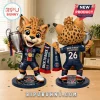 Cheetah mascot figurine wearing Paris Saint-Germain jersey with number 26, holding a championship trophy and team scarf.!