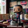 Vinyl bobblehead figure of a male soccer player in PSG kit holding a Champions League trophy and scarf on a display base.!