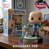 Pep Guardiola vinyl figure holding a Champions League trophy and tactics board on a Manchester City logo grass base.!