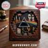 Brown leather bi-fold wallet embossed with Pink Floyd album art, 60th anniversary text, brick wall, and iconic prism design.!