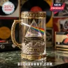 Pink Floyd glass beer stein featuring The Dark Side of the Moon prism, brick wall texture, and 61st anniversary gold base.!