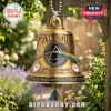 Brass-colored metal bell ornament with Pink Floyd Dark Side of the Moon prism graphic, clock icons, and anniversary text.!