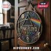 Round wooden wall sign featuring Pink Floyd Dark Side of the Moon prism artwork, electric guitars, and vinyl record art.!