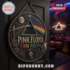 Round wooden wall sign featuring Pink Floyd Dark Side of the Moon prism art, hanging on a dark door by a rope.!