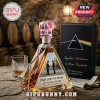 Pink Floyd Dark Side of the Moon 60th anniversary rum bottle with pink glass pig stopper and black presentation box.!
