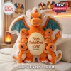 Large orange Charizard plush pillow featuring four small Charmander plushies and text reading Best PokéDad Ever.!