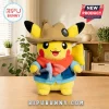 Pikachu plush toy wearing a brown felt explorer hat, blue vest, red neckerchief, and holding a small grey pickaxe tool.!