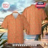 Short-sleeve button-down shirt featuring an orange base with repeating teal and white diamond ikat patterns.!