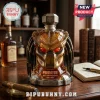 Predator 40th anniversary whiskey decanter made of amber glass with glowing red eyes and metallic helmet-shaped stopper.!