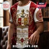 Kappa Alpha Psi fraternity t-shirt in crimson and white featuring a large golden crest, scrollwork, and Greek lettering.!
