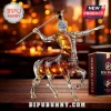 Remy Martin Centaur-shaped glass cognac decanter holding a spear, sitting on a wooden table with its product box.!