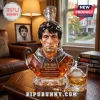 Rocky Balboa faceted amber glass decanter bust with 1976-2026 Italian Stallion text and boxing glove stopper on table.!