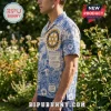 Man wearing short-sleeve button-down shirt with blue and white toile pattern featuring the Rotary International logo.!